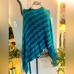 Turquoise knitted poncho